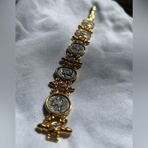 Pegasus pewter color coin and angel oval cabochon link bracelet.